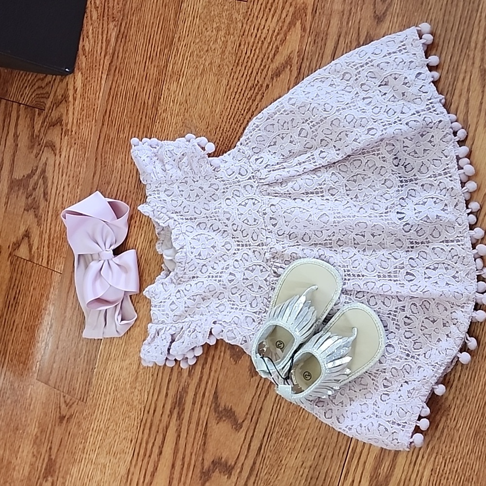 3 piece baby girl mauvey pink dress,bow and sandals. 6 to 12 months. Never worn